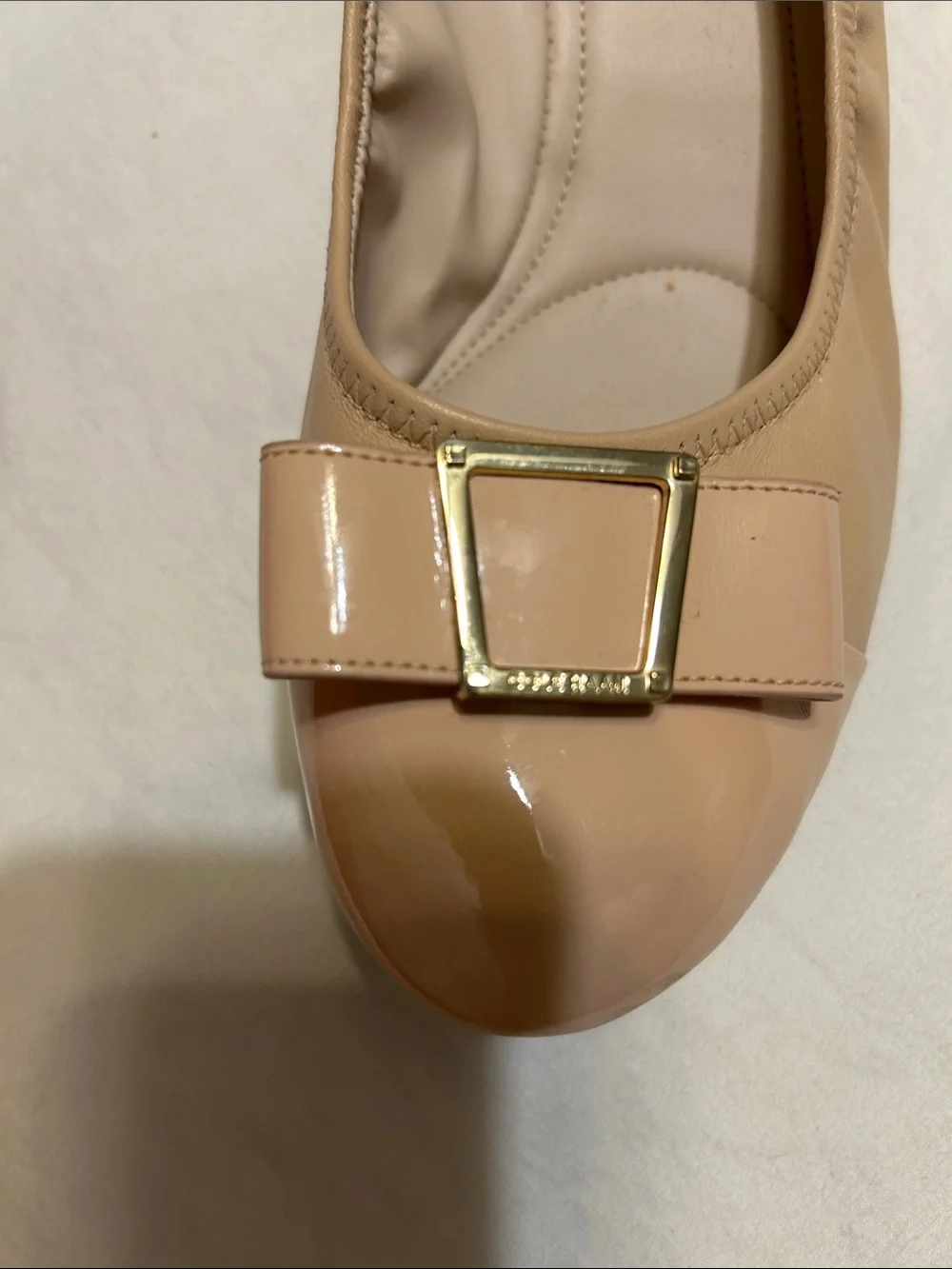 Cole Haan Beige Patent Leather Ballet Flats with Bow Accent